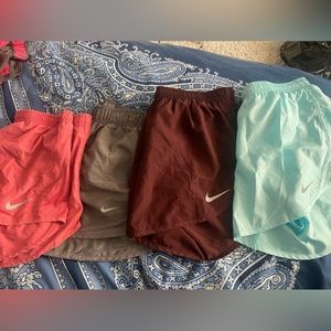 4 pairs of Nike Dry fit shorts size medium